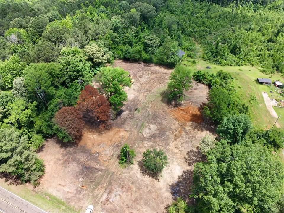 Aerial view of a large commercial development site under preparation in Mississippi